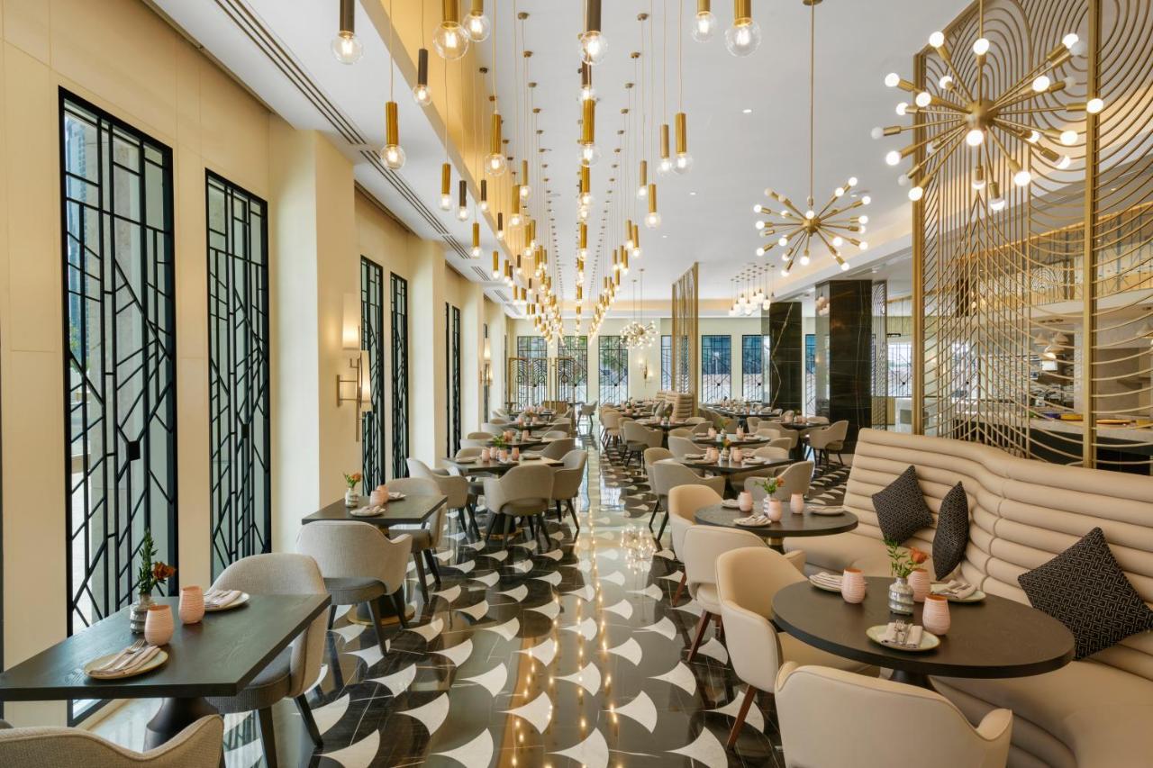 Wyndham Grand Doha West Bay Beach Экстерьер фото The restaurant